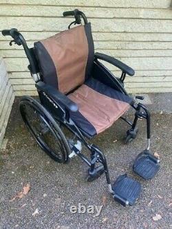 G-Logic Excel Vanos Lightweight folding wheelchair with accessories
