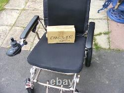 Lightweight Folding Electric Wheelchair 4 Months from New. Used indoors