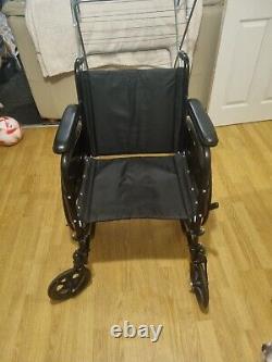 Lightweight folding self propelled wheelchair