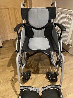 Lightweight folding self propelled wheelchair And Left Leg Raise