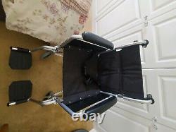 Wheelchair as new. Never used. Black, lightweight. Easy to fold to go in car boot
