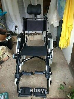 Wheelchair, reclining, foldable, lightweight, with headrest and leg supports